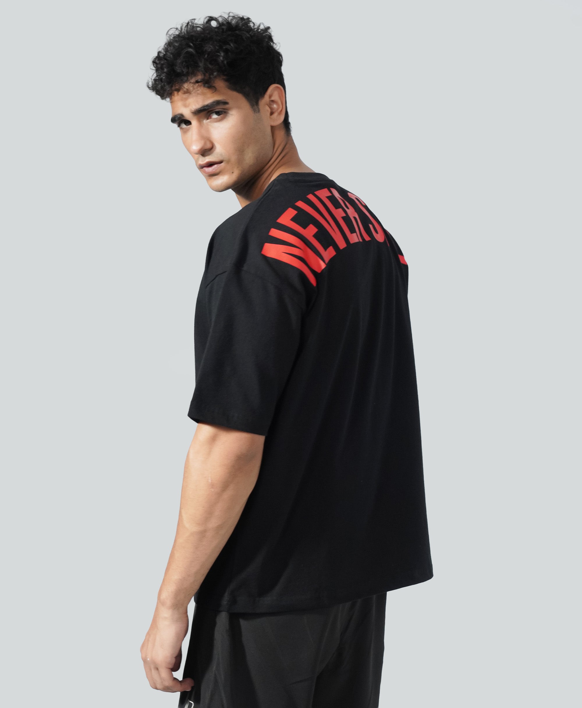 Never Still Oversized Tee - Black / Rawan Red