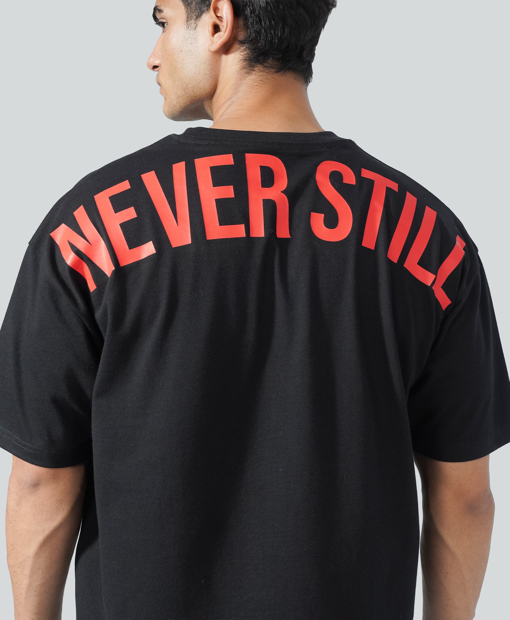 Never Still Oversized Tee - Black / Rawan Red