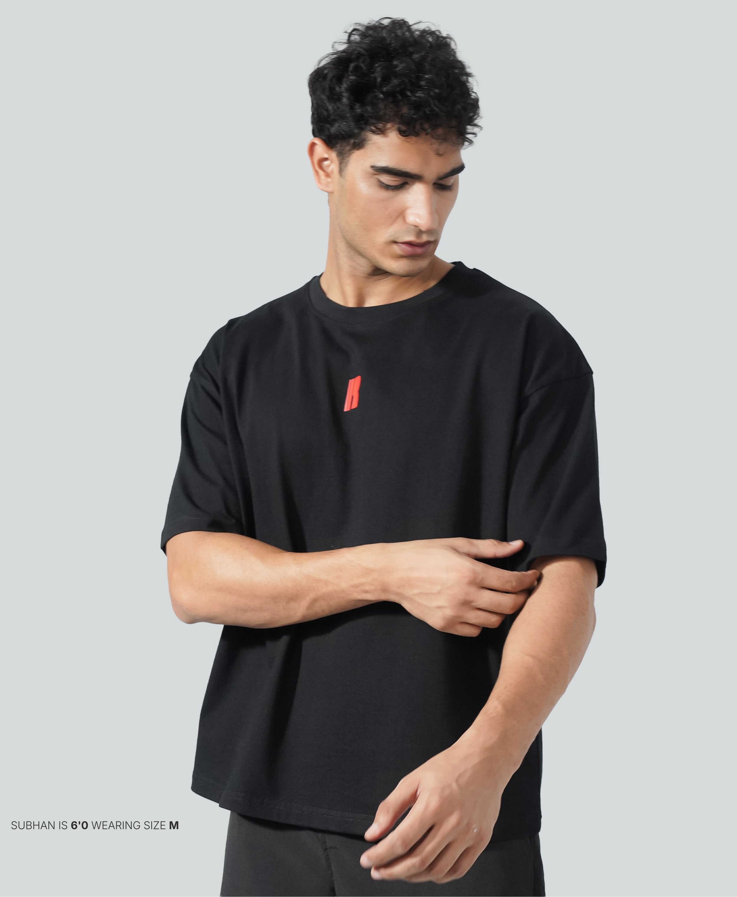 Never Still Oversized Tee - Black / Rawan Red