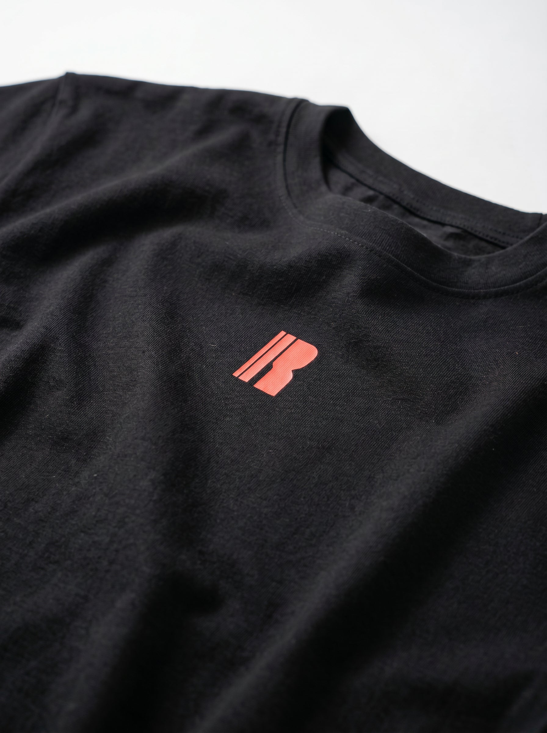 Never Still Oversized Tee - Black / Rawan Red